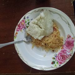 Ugali and fried cabbage A picture of Ugali and fried cabbage.