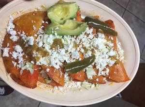 Una foto de Enchiladas de papa y chorizo