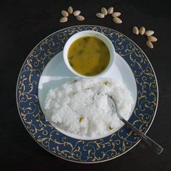 A picture of Gujrati dal with rice.