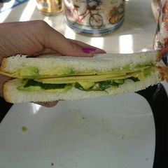 A picture of Avocado, Basil and Cheese Sandwich or Snack.