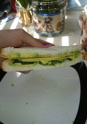 A picture of Avocado, Basil and Cheese Sandwich or Snack.