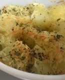 Papas al horno con queso y orégano