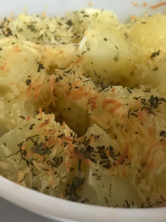Una foto de Papas al horno con queso y orégano