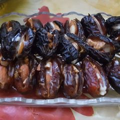 A picture of Ajwa khajoor with badaam akhrot.