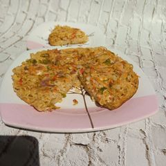 Indomie pizza A picture of Indomie pizza.