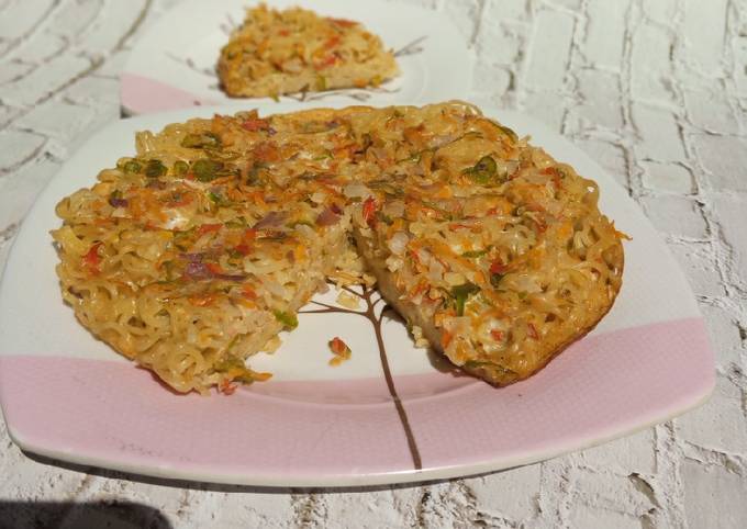 Indomie pizza Recipe by Chef K. Madaks Bakery - Cookpad