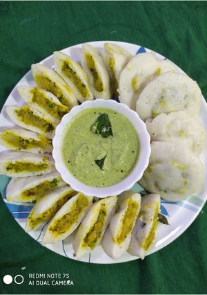 A picture of Stuffed Idli with coconut mint Chutney.