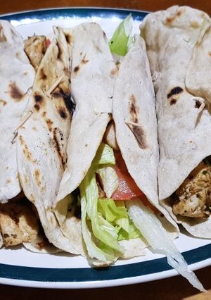 Una foto de Burritos o fajitas