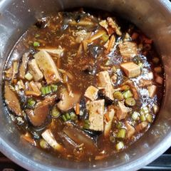A picture of Hot and sour soup.
