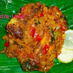 A picture of Fish polichathu with Banana leaf.