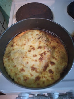 Una foto de Pechuga empanizada 3 quesos al horno
