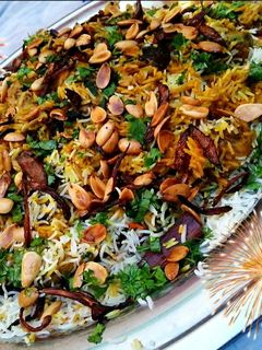 صورة لوصفة برياني الدجاج بنكهة الكزبرة والنعناع 🍚🍗