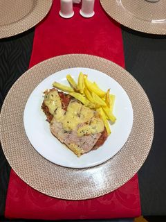 Una foto de Milanesa a la Napolitana 🇦🇷