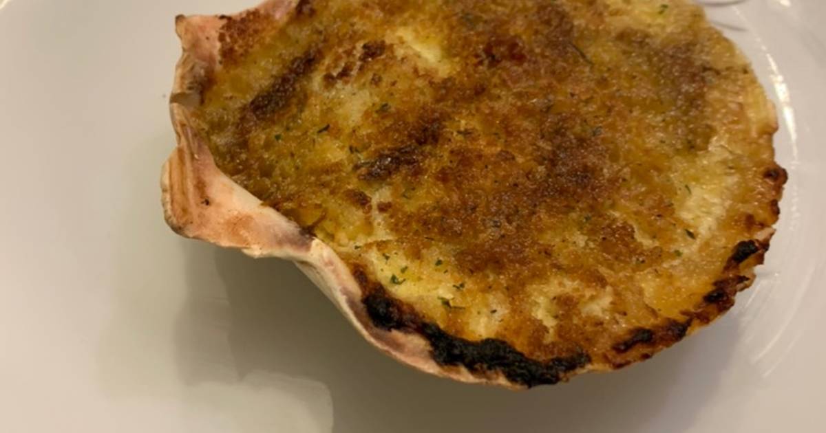 Vieiras gratinadas rellenas de marisco Receta