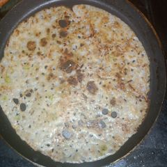 A picture of Onion rava dosa.