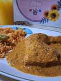 Guiso de piernas de pollo con tomate y ajonjolí