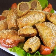 A picture of Mini Cheesy Meatball Pies Wrapped in Puff Pastry.