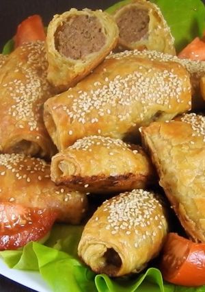 A picture of Mini Cheesy Meatball Pies Wrapped in Puff Pastry.