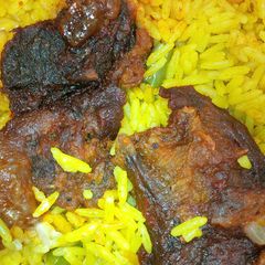 A picture of Fried rice and fried beef.