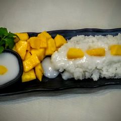 A picture of Sweet Sticky Rice with Coconut and Mango.