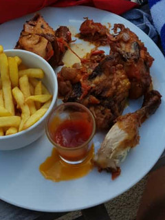A picture of Chicken and chips.