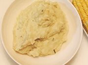 A picture of mashed potato with heavy cream