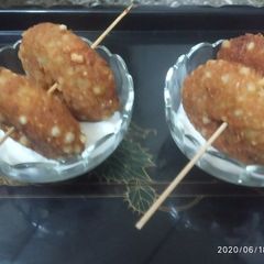 A picture of Sabudana vada in sweet curd.