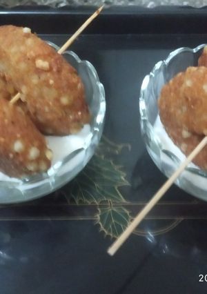 A picture of Sabudana vada in sweet curd.