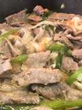 Bistec de Res encebollado