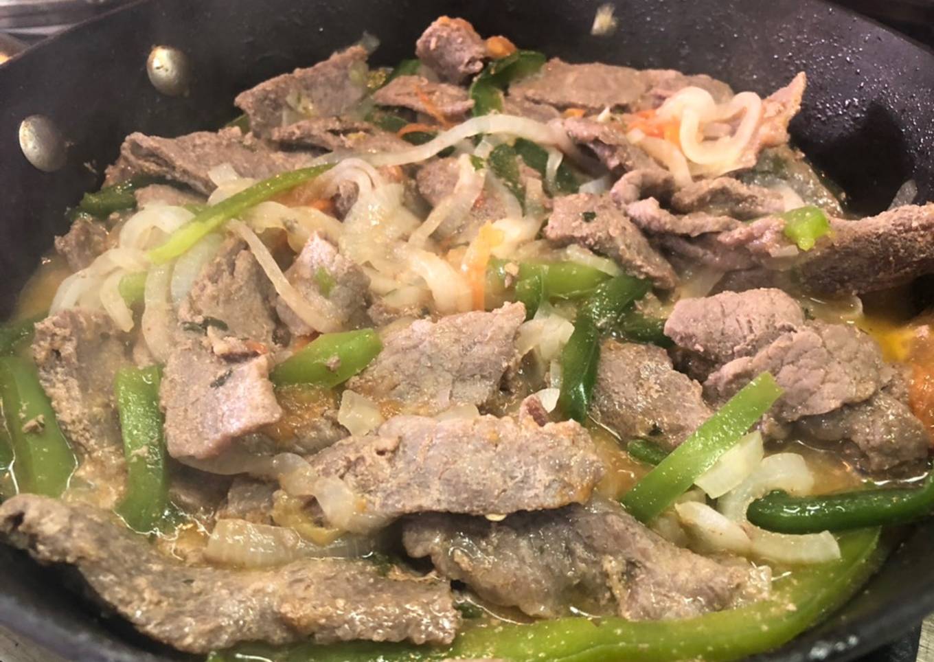 Bistec de Res encebollado