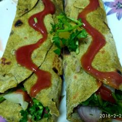 A picture of Oats wheat green khati roll.