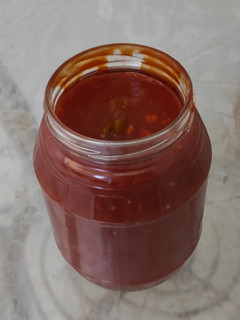 Una foto de Tomate triturado con jengibre y ajo casero