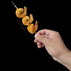 Tandoori Prawns Skewers A picture of Tandoori Prawns Skewers.