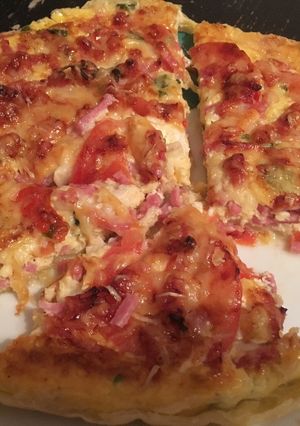 Une photo de Tarte à la tomate, fromage de chèvre et jambon