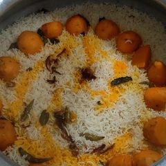 A picture of Hyderabadi biryani in kacchi biryani style.