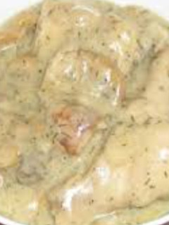 Una foto de Hongos en salsa blanca con pollo