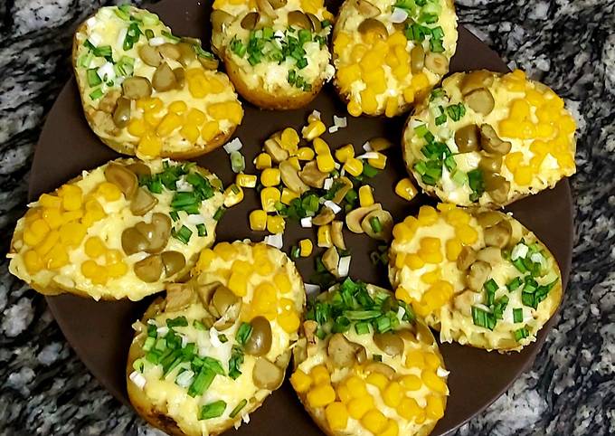 Recipe of Homemade Baked potatoes loaded with cheese😋