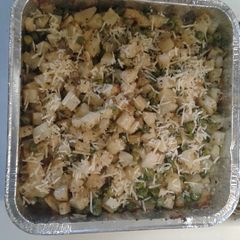 A picture of Roasted potatoes and peas.