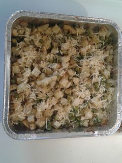 A picture of Roasted potatoes and peas.