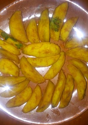 A picture of Potato wedges.