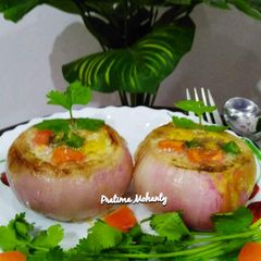 A picture of Poached Egg in Grilled Onion Bowl.