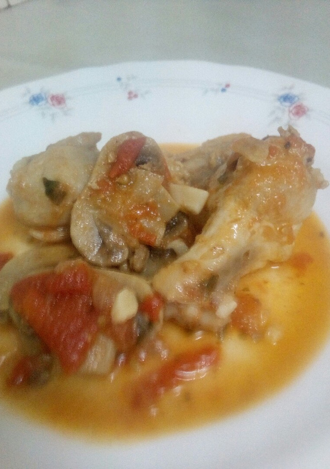 Una foto de Pollo con champiñones
