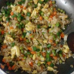 A picture of Fried rice with vegetables.