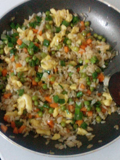 A picture of Fried rice with vegetables.
