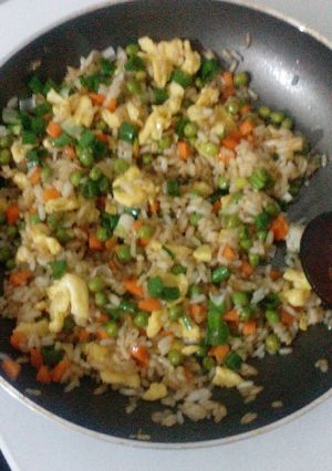 A picture of Fried rice with vegetables.