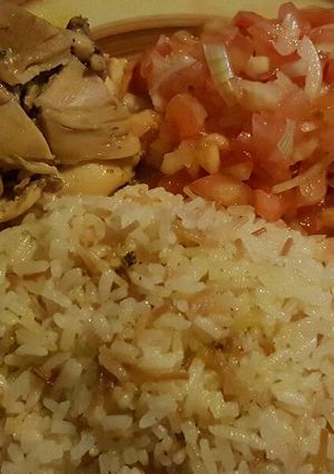 A picture of Panamanian-Style Chicken, Jude’s Vermicelli Rice, and Tomato Salad.