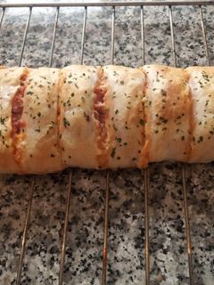 Una foto de Pizza de hojaldre enrollada