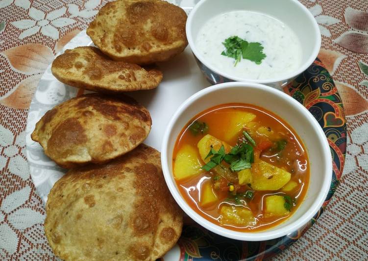 Ajwain ki Poori with Aloo Tamatar Sabzi