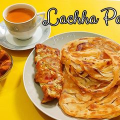 A picture of Lachha paratha With Spicy Egg:.