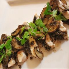 A picture of Turkey with a Wild Mushroom Crust.